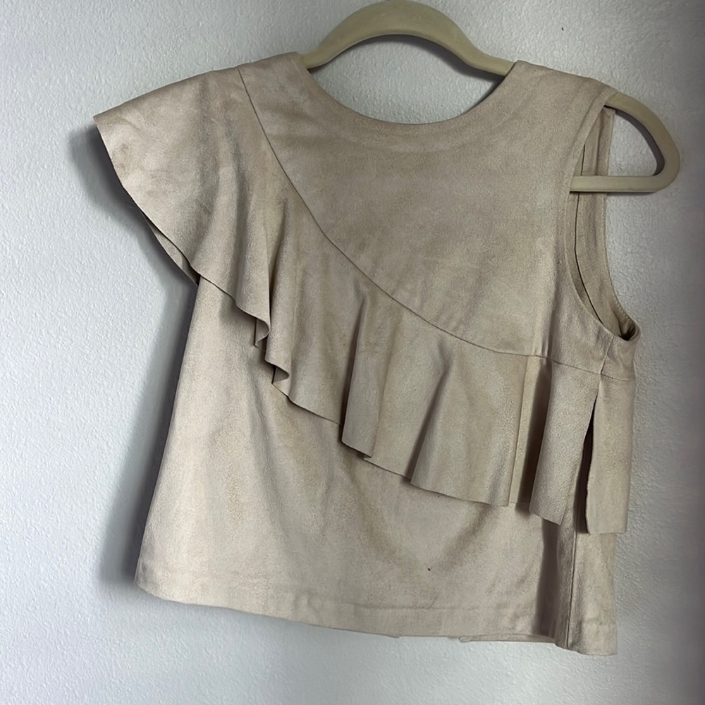 Asymmetric Top by Mango